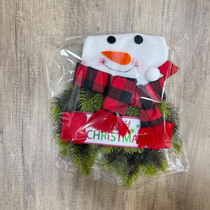 Lighted Snowman Christmas wreath with Merry Christmas sign and red plaid scarf
