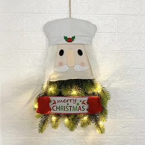 Nutcracker Christmas wreath with LED lights and Merry Christmas banner wall decor