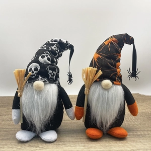 Detailed close-up of Halloween gnomes featuring skull patterns and spider web knitted hats