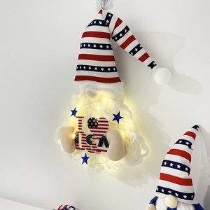 Detail of plush Patriotic Independence Day gnome with LED lights and I Love USA heart sign