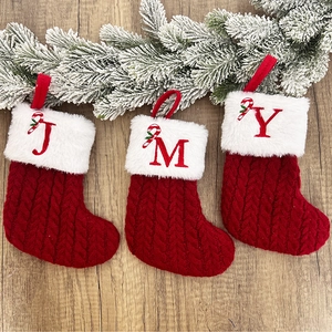 Set of 3 red knitted Christmas stockings with J, M, Y letters and white plush cuffs