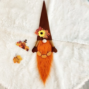 Harvest Festival gnome plush wreath with sunflower and pumpkins on white fur background