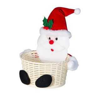 Detail view of Santa Claus plush figure on a woven wicker Christmas candy storage basket