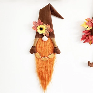 Harvest festival gnome wreath decoration with sunflower and pumpkins for home wall decor