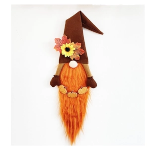 Close-up of harvest gnome wreath with sunflower maple leaf and small pumpkins