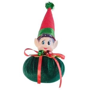 Detail of Christmas elf doll with red hat and metal bells for festive home decoration