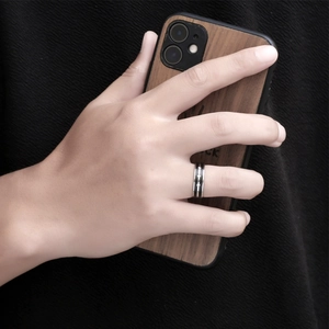 Polished black stainless steel ring with silver stripes and three inlaid crystals