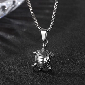 Polished stainless steel sea turtle pendant necklace with detailed shell on bead chain