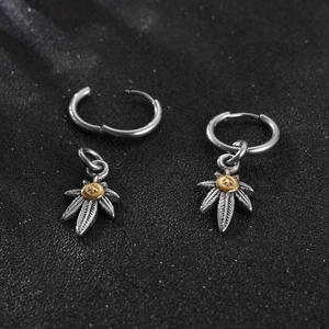 Silver stainless steel hoop earrings with vintage engraved leaf pendants and gold accents