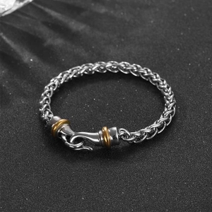 Men's hip-hop braided titanium steel bracelet with gold accents and eagle hook clasp