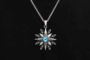 Macro shot of retro stainless steel eight-pointed star pendant with blue evil eye detail