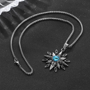 Retro gothic star pendant necklace with blue evil eye detail on woven chain link
