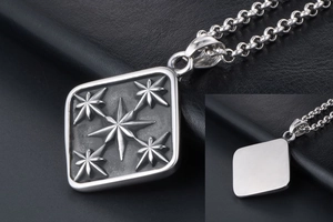 Detail of vintage square star pendant with relief craft and polished mirror back