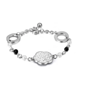Bracelet élégant en acier titane avec fleur en strass et perles noires et blanches