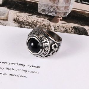 Vintage Sanskrit titanium steel ring with black agate stone in an ornate silver setting