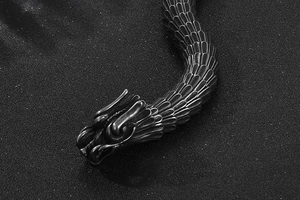 Detailed close-up of retro stainless steel dragon scale bracelet with intricate carving