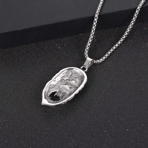 Retro stainless steel Sun Wukong pendant necklace with textured monkey king mask design