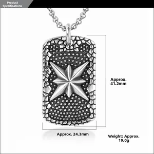 Macro detail of vintage dog tag pendant with star motif and honeycomb texture