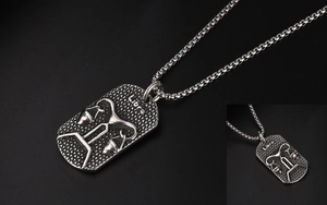 Detailed view of Libra zodiac pendant with vintage hammered texture and box chain