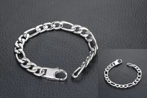 Detailed macro view of silver steel Figaro chain bracelet with secure lobster clasp