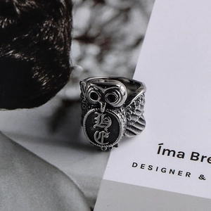 Vintage gothic owl ring for men in retro stainless steel with intricate feather details