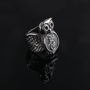 Detailed macro shot of vintage owl ring with dark finish and engraved soul symbol