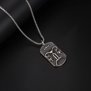 Silver Libra zodiac necklace with embossed rectangle pendant and fine link chain