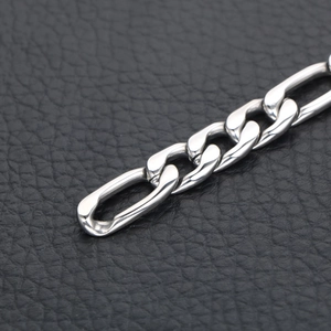 Polished silver Figaro link chain for men in stainless steel with high glossy finish