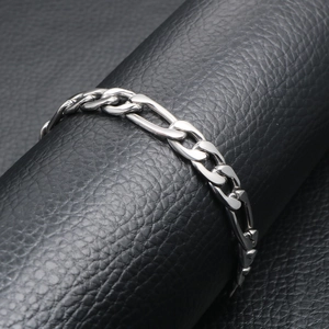Polished silver Figaro chain bracelet in stainless steel for men with high gloss finish