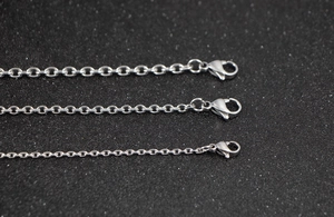 Three different sizes of silver stainless steel O-chains with secure lobster clasps