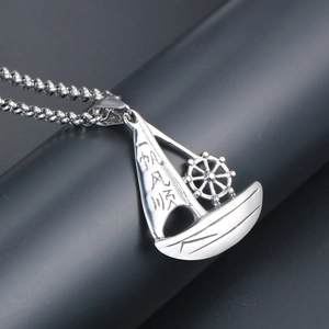 Polished stainless steel sailboat necklace with smooth sailing Chinese engraving