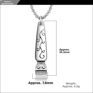 Macro view of vintage silver barber clipper pendant with dimensions and detailed engraving