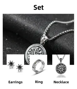 Detailed view of vintage sunburst jewelry set including necklace, ring and stud earrings