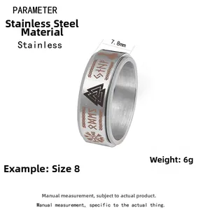 Detail showing 7.8mm wide silver Nordic Viking stainless steel spinner ring with runes