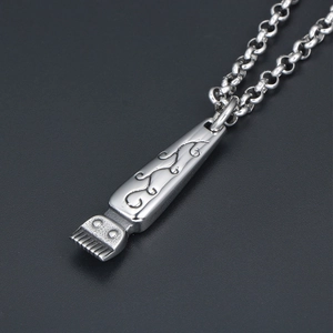 Vintage punk titanium steel hair clipper pendant necklace with ornate floral engravings