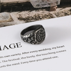 Vintage men's stainless steel signet ring with irregular rock texture in silver finish
