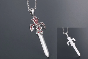 Detail of silver sword pendant with red rhinestones and back view on grey background