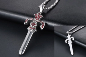 Detail of silver cross sword pendant with red zircon stones and box chain back view