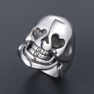 Vintage punk skull ring for men with heart shaped eye sockets in polished steel