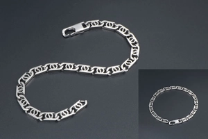 Detail of silver titanium steel chain bracelet with lobster clasp and intertwined rings