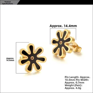 Detail of titanium daisy studs with gold plating, black petals and red center zircon
