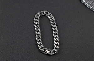 Close-up of vintage silver Cuban chain bracelet with rectangular secure clasp