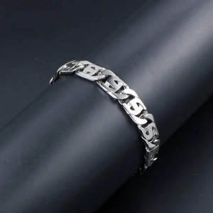 Bracelet pour homme en acier inoxydable argenté poli avec maillons en forme de S punk