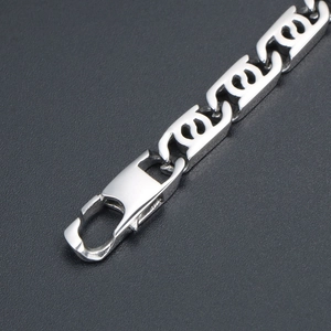 Polished silver titanium steel chain bracelet with intricate hollowed punk design links