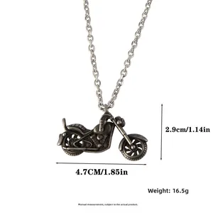 Detailed view of vintage silver motorcycle pendant with size 4.7cm x 2.9cm dimensions