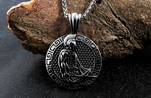 Detailed relief of a Spartan warrior on a stainless steel pendant with Greek key edges