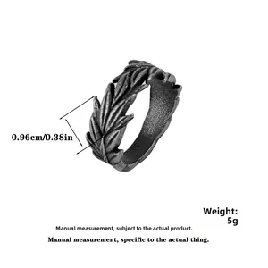 Macro detail of retro wheat pattern steel ring showing 0.96cm width and 5g weight
