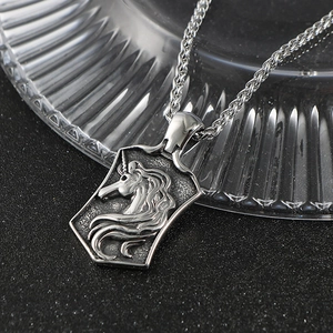Vintage steel shield necklace with unicorn relief and heavy braided wheat chain