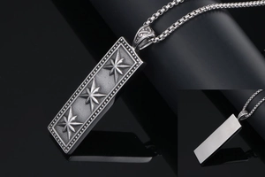 Macro detail of retro square star pendant with antique silver finish and steel chain
