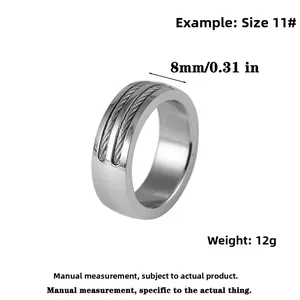 Macro detail of 8mm stainless steel industrial ring featuring double steel cable inlay